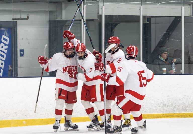 PHOTOS: North defeats Taunton on the ice