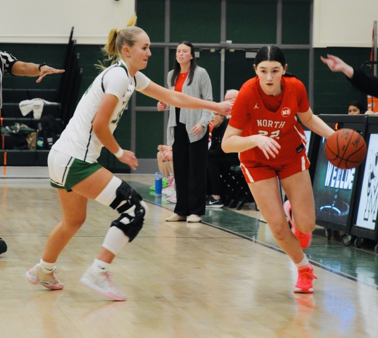 PHOTOS: North comes close in varsity game